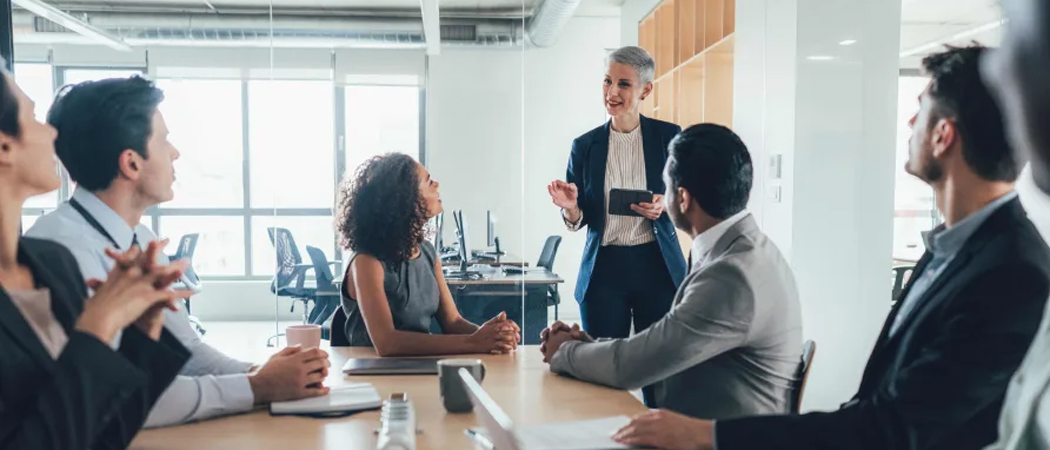 Office team assessing identified psychosocial risks to improve workplace psychological safety and wellbeing.