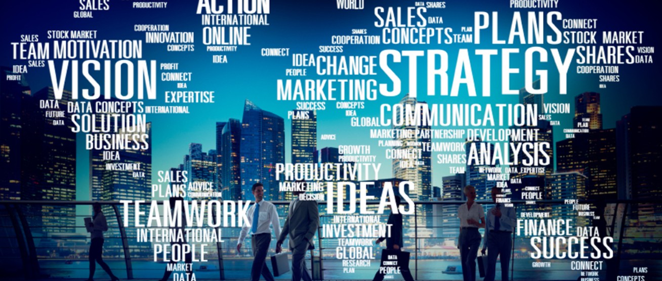A bustling city scene with blurred business people walking past, overlaid with leadership and business-related keywords, symbolising activity in a volatile and fast-paced world.